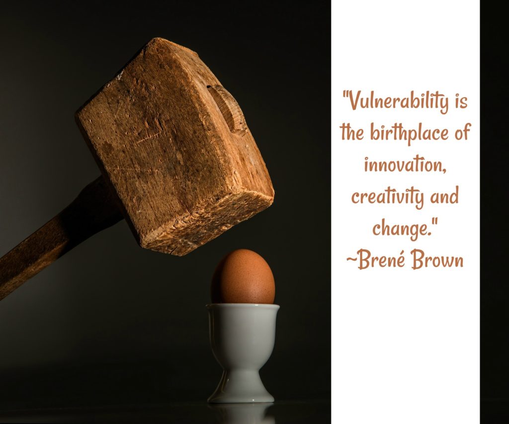 Brene Brown quote on vulnerability with mallet over egg.