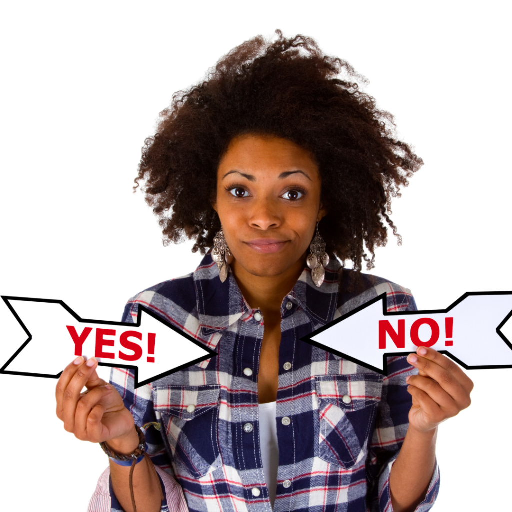 A black woman wearing a plaid shirt holding a yes arrow in one hand and a no arrow in the other.